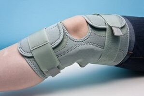 Knee brace for fixing a joint affected by arthrosis
